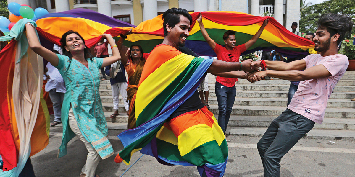 Members of the LGBT community dance to celebrate after the country's top court struck down a colonial-era law that made homosexual acts punishable by up to 10 years in prison, in Bangalore, India, Thursday, Sept. 6, 2018. The court gave its ruling Thursday on a petition filed by five people who challenged the law, saying they are living in fear of being harassed and prosecuted by police. (AP Photo/Aijaz Rahi)