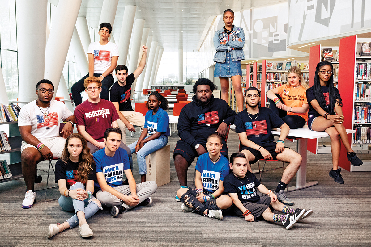 March for Our Lives activists pose for a photo in Washington, D.C., in July 2018. Top, from left: Daniel Williams and Bria Smith. Seated, middle row, from left: Jammal Lemy, Matt Deitsch, Matt Post, Naomi Wadler, Alex King, Ramon Contreras, Jaclyn Corin, and Kyrah Simon. Seated on the floor, from left: Lauren Hogg, David Hogg, Emma González, and Brandon Farbstein. (Jesse Dittmar)